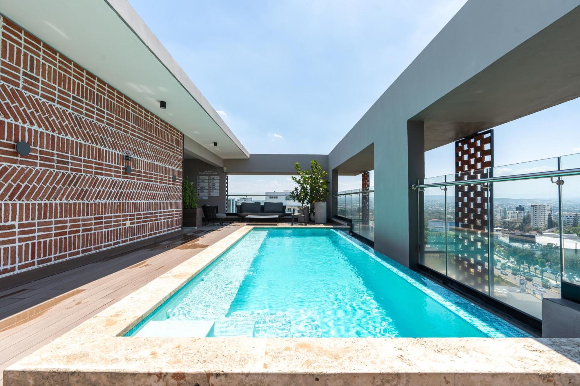 Modern Luxury Condo With Rooftop Pool & Gym Сантяго де лос Кабайерос Екстериор снимка